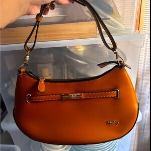 Women’s brown shoulder bag